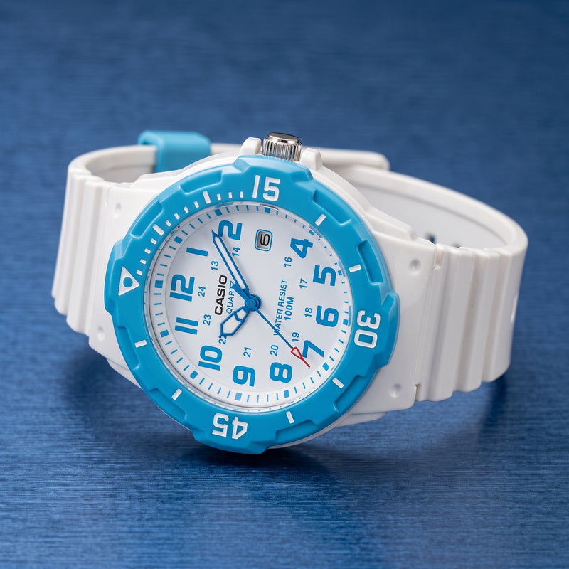 children's wristwatch on a blue surface